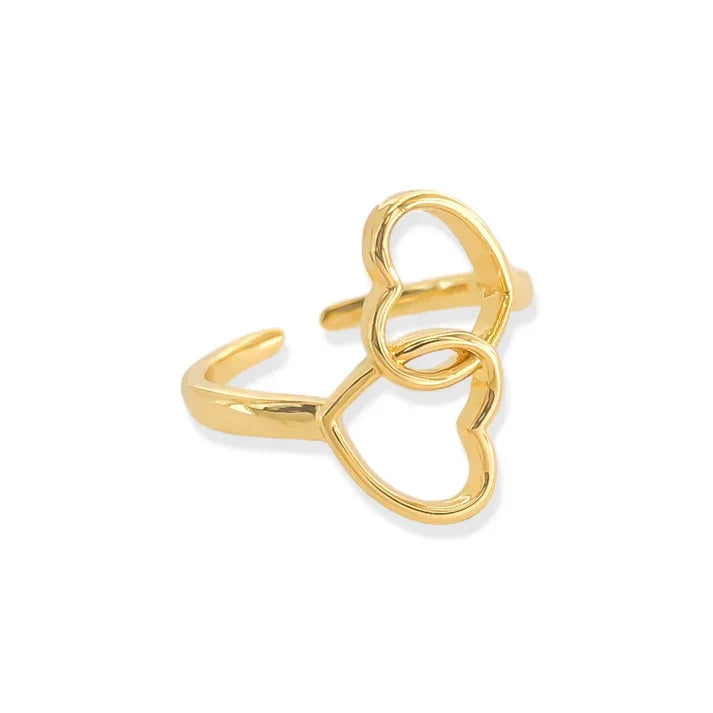 Gold-colored heart ring adjustable with interlocking heart-shaped outlines for elegant wear