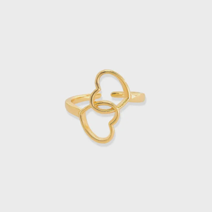 Gold-colored heart ring adjustable with intertwined heart shapes for elegant jewelry style
