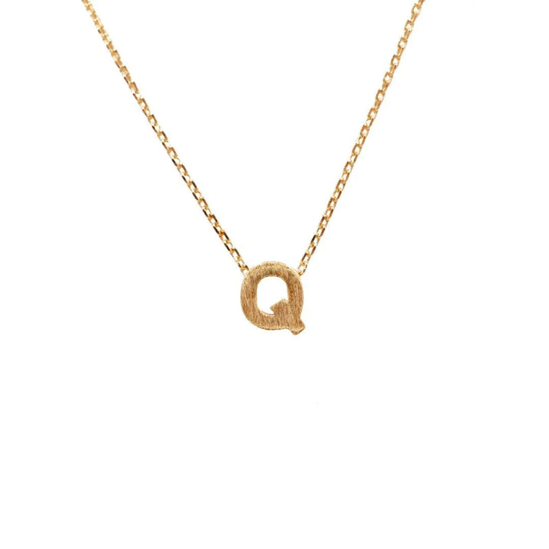 Gold Crescent Necklace from Daisy Lane showcasing Initial Q in dainty design