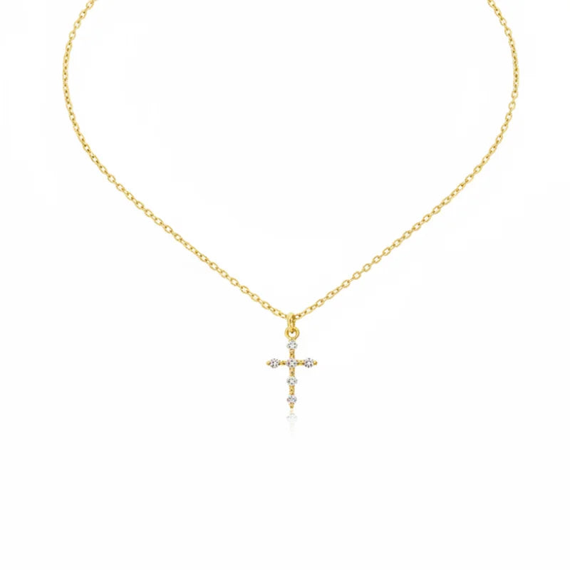 Gold cross pendant necklace with diamond accents from Belief Gold Cross collection