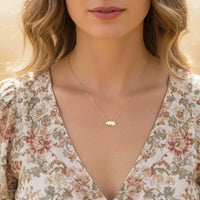 California bear pendant necklace with gold elephant design