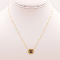 Gold Elephant Necklace featured in the Mama Bear Necklace collection