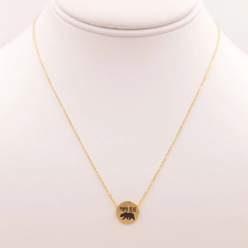 Gold Elephant Necklace featured in the Mama Bear Necklace collection