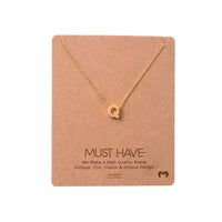 Gold Heart Necklace from Daisy Lane, a stunning Initial Q Gold piece for elegant layering