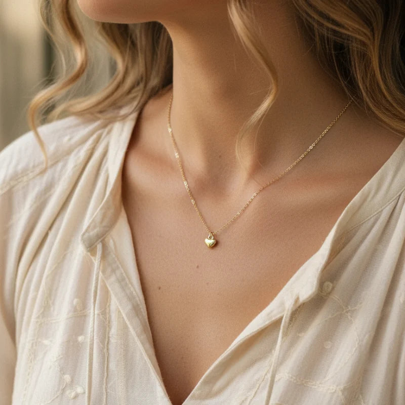 Gold dipped heart necklace with delicate chain and pendant