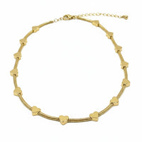 Golden heart charm necklace with beaded bracelet design