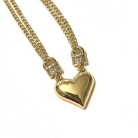 Dainty layered golden heart necklace with diamond accents for boho chic women