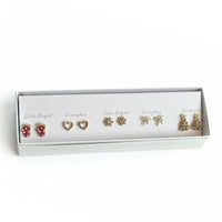 Wanderlust Jewels gold heart-shaped stud earrings in white box