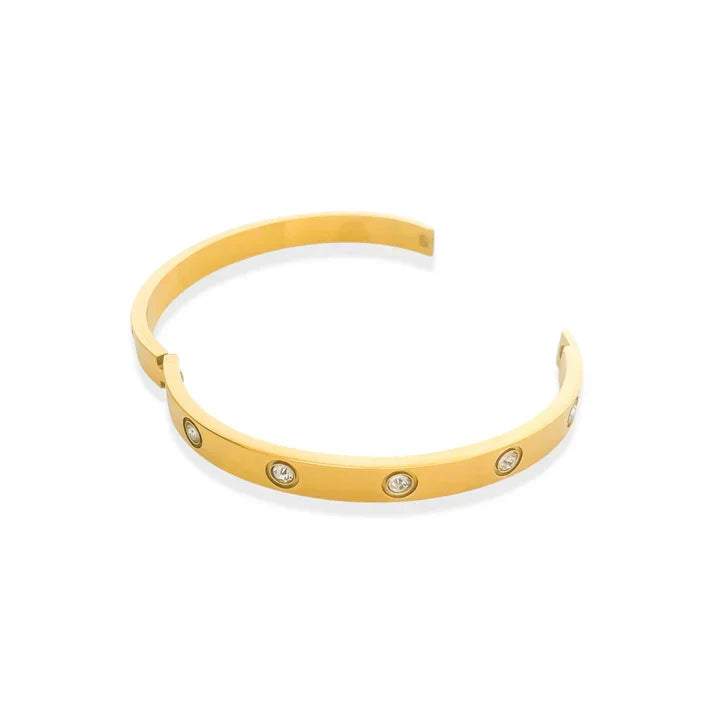 Gold hinged bangle bracelet with circular cubic zirconia accents, water resistant cubic design