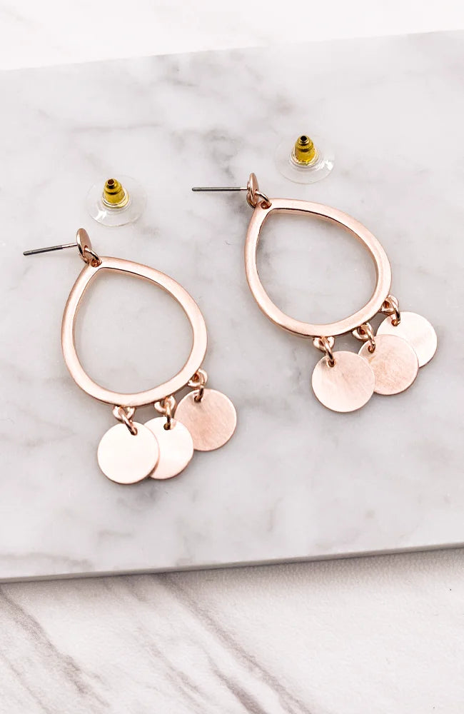 Rose Gold Circular Drop Earrings elegantly displayed showcasing gold circular design