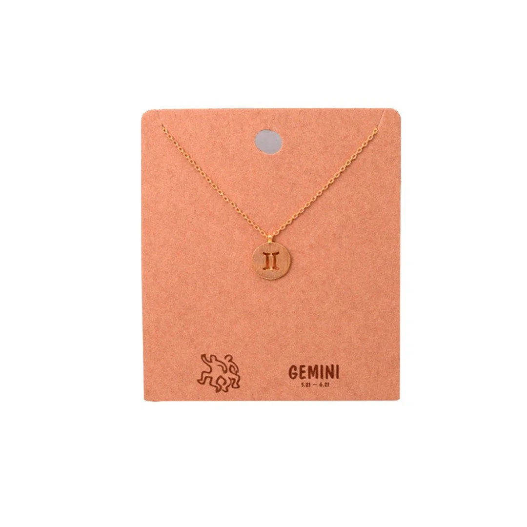 Gold Initial Necklace showcasing the Gemini Zodiac Sign in elegant design