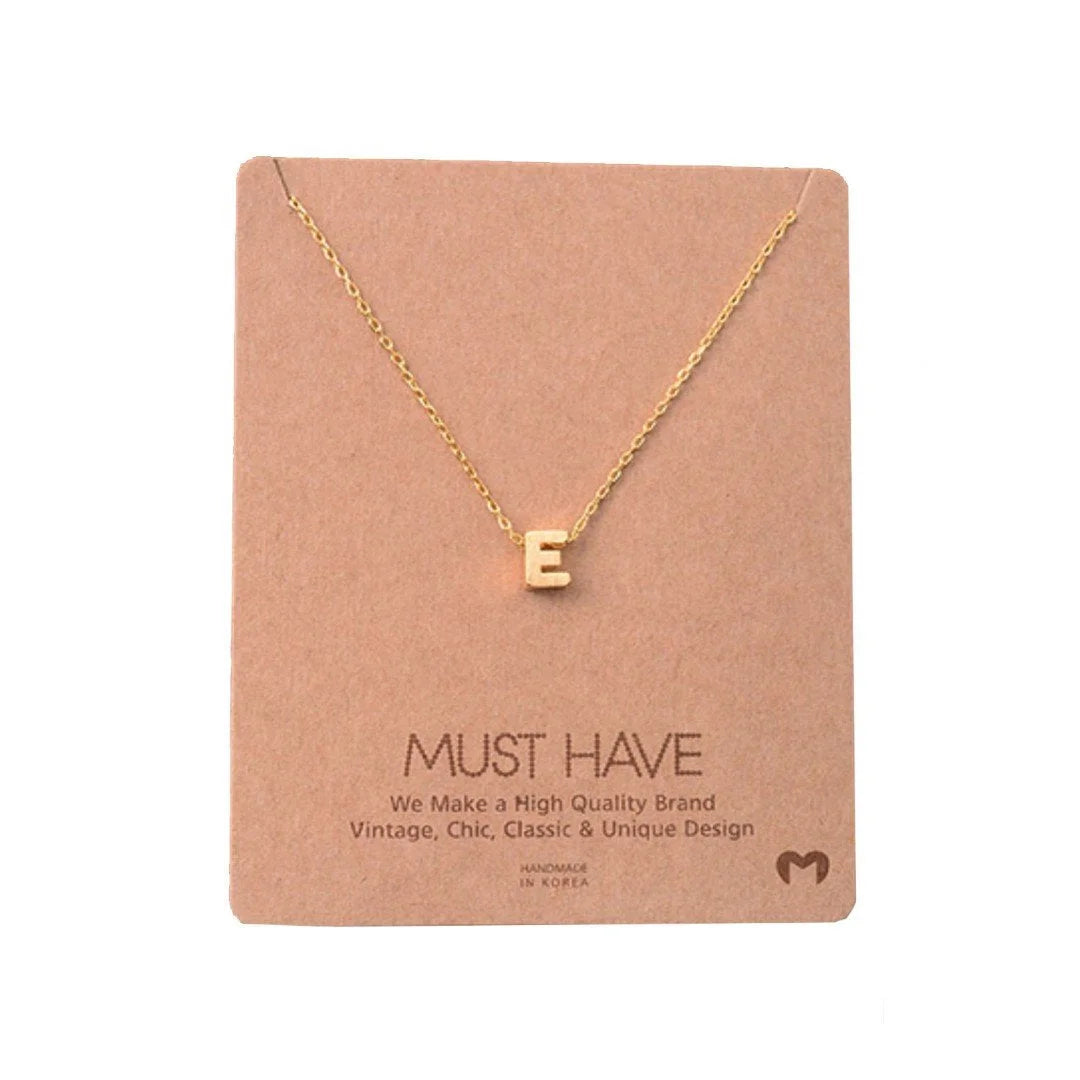 Dainty Initial E Gold Necklace from Daisy Lane showcasing elegant charm and style