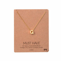 Dainty Initial G Gold Necklace from Daisy Lane showcasing elegant design and personalization