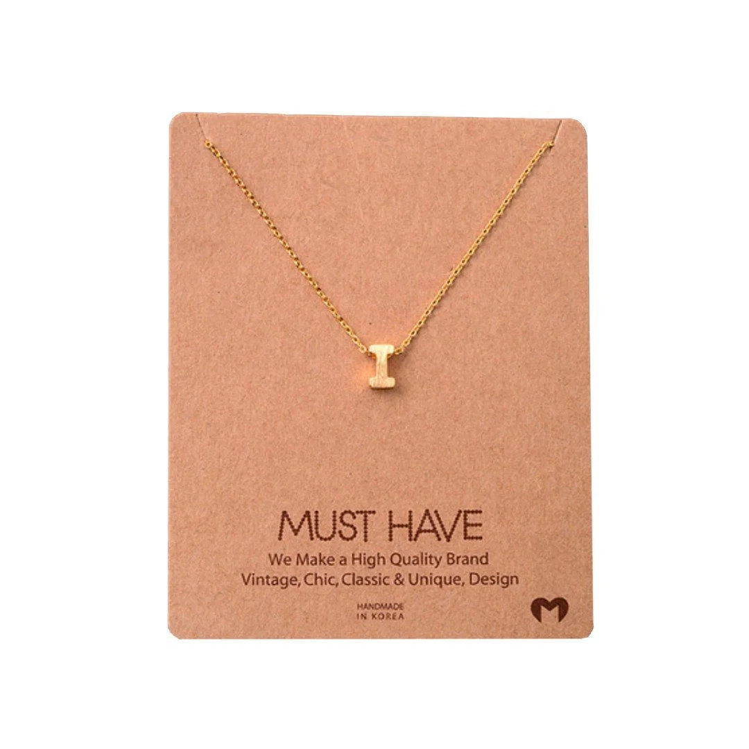 Dainty Initial I Gold Necklace from Daisy Lane, perfect for elegant personalization