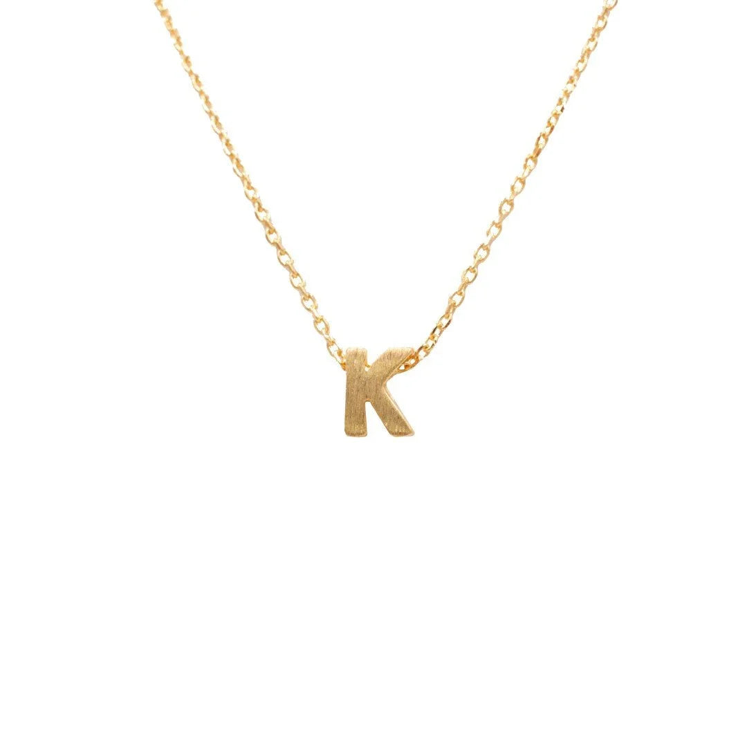 Dainty Initial K Gold Necklace from Daisy Lane elegantly displayed for purchase