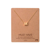 Dainty Initial M Gold Necklace from Daisy Lane, perfect for personalized jewelry lovers