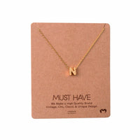 Dainty Initial N Gold Necklace from Daisy Lane showcasing elegant design and personalization