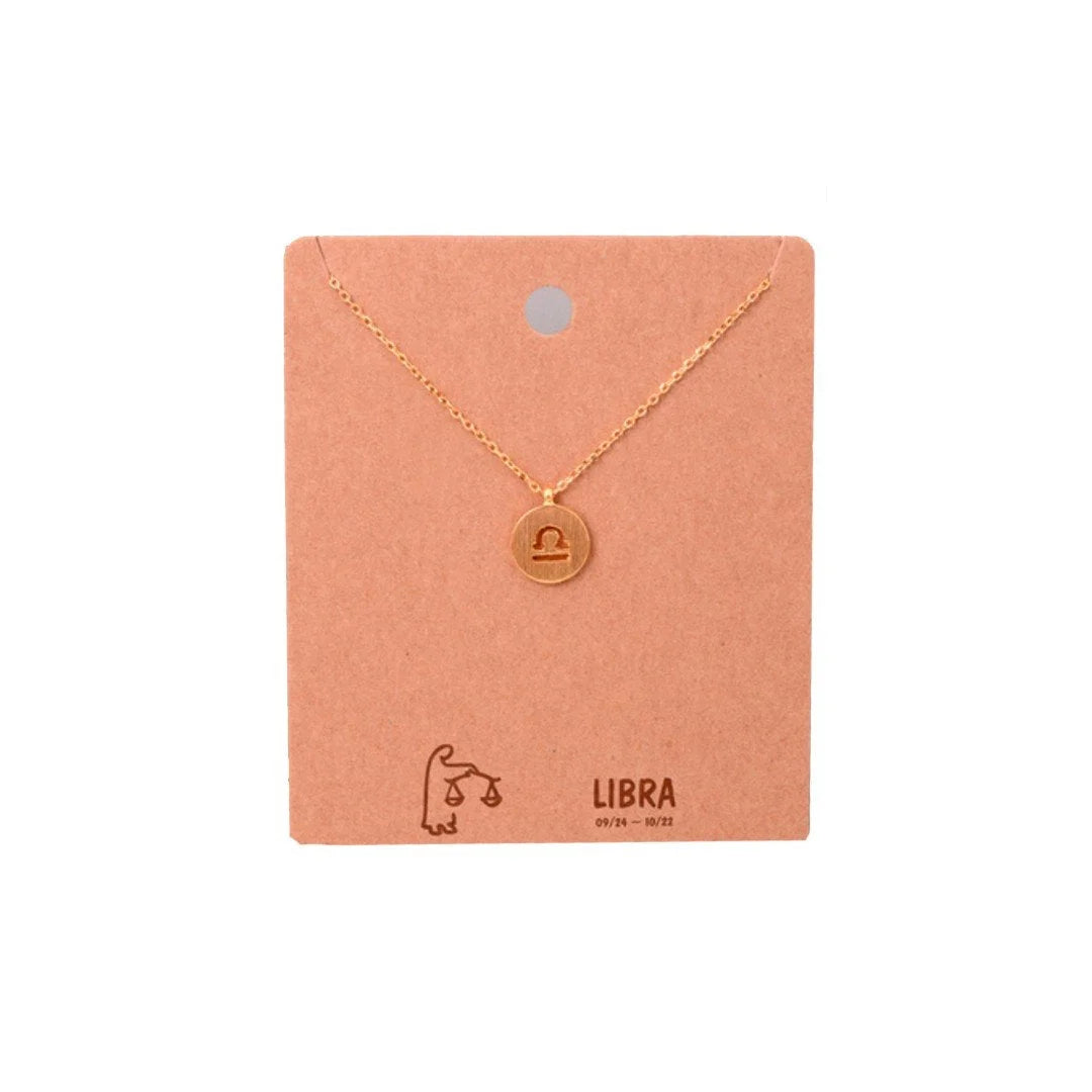 Gold Initial Necklace showcasing the Libra Zodiac Sign, perfect for astrology lovers