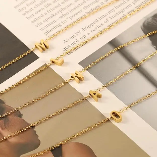 Gold initial necklaces showcasing personalized dainty jewelry for stylish women
