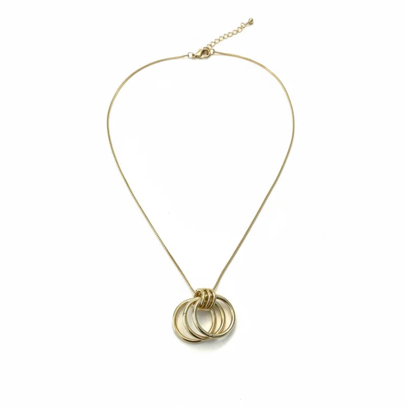 Gold interlocking ring necklace with layered circles and delicate chain