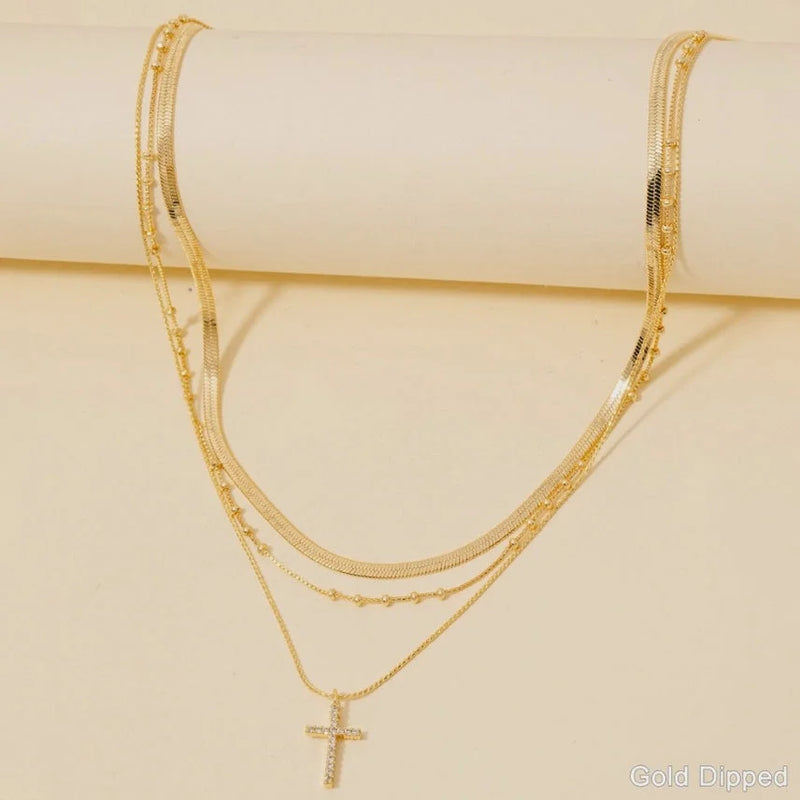 Gold dipped layered chains with pave cross layered design for elegant jewelry styling