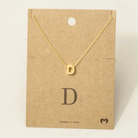 Gold letter D necklace with a dainty, minimalist design from Personalized Initial Jewelry