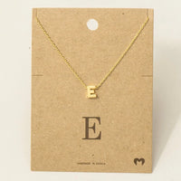 Gold letter E necklace with square pendant and delicate chain from Personalized Dainty Jewelry