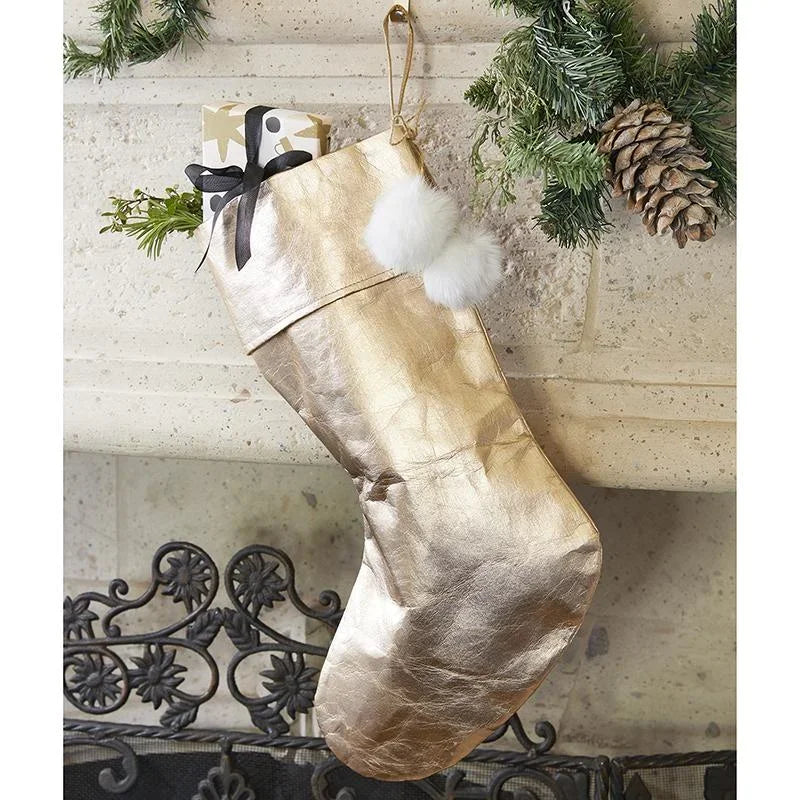 Gold metallic Christmas stocking with fluffy trim and black ribbon for Rose Gold decor