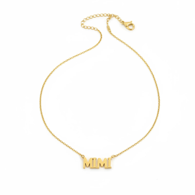 Gold dipped Mimi charm necklace with delicate chain and lobster clasp for elegant style
