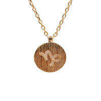 Gold necklace featuring a bird, ideal for Capricorn Zodiac Sign enthusiasts