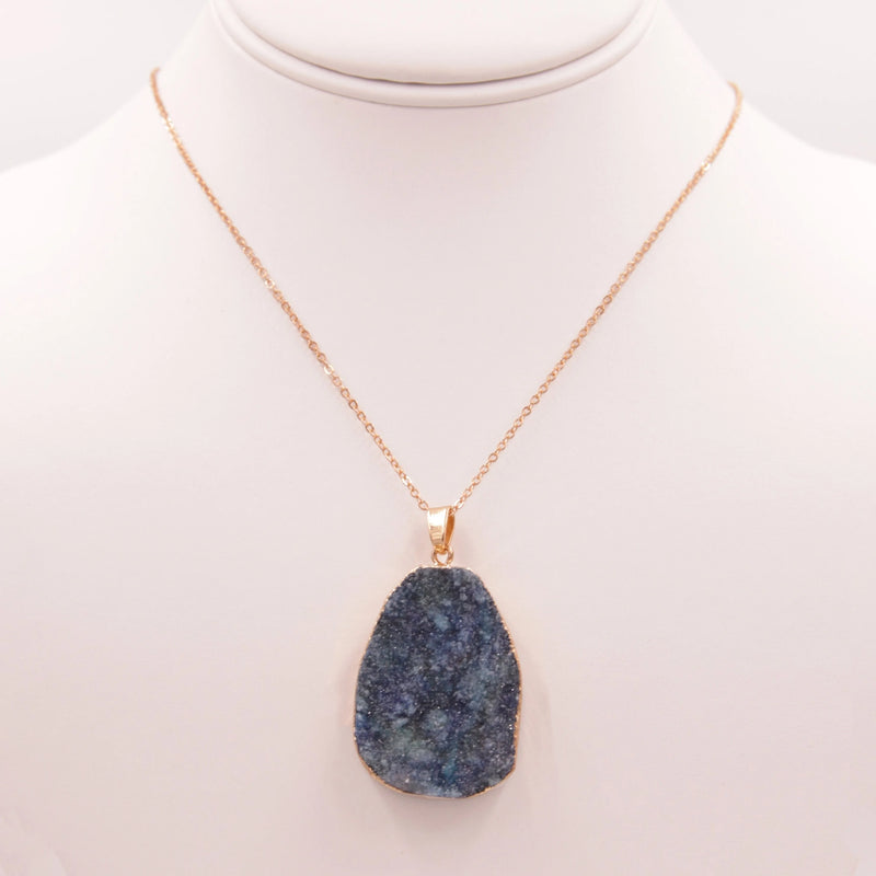 Gold necklace featuring a blue quartz genuine stone pendant in elegant design