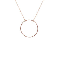 Gold circular pendant necklace featuring an elegant circle pendant design