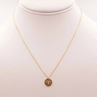 Gold Aries Zodiac Sign Necklace featuring a decorative coin pendant