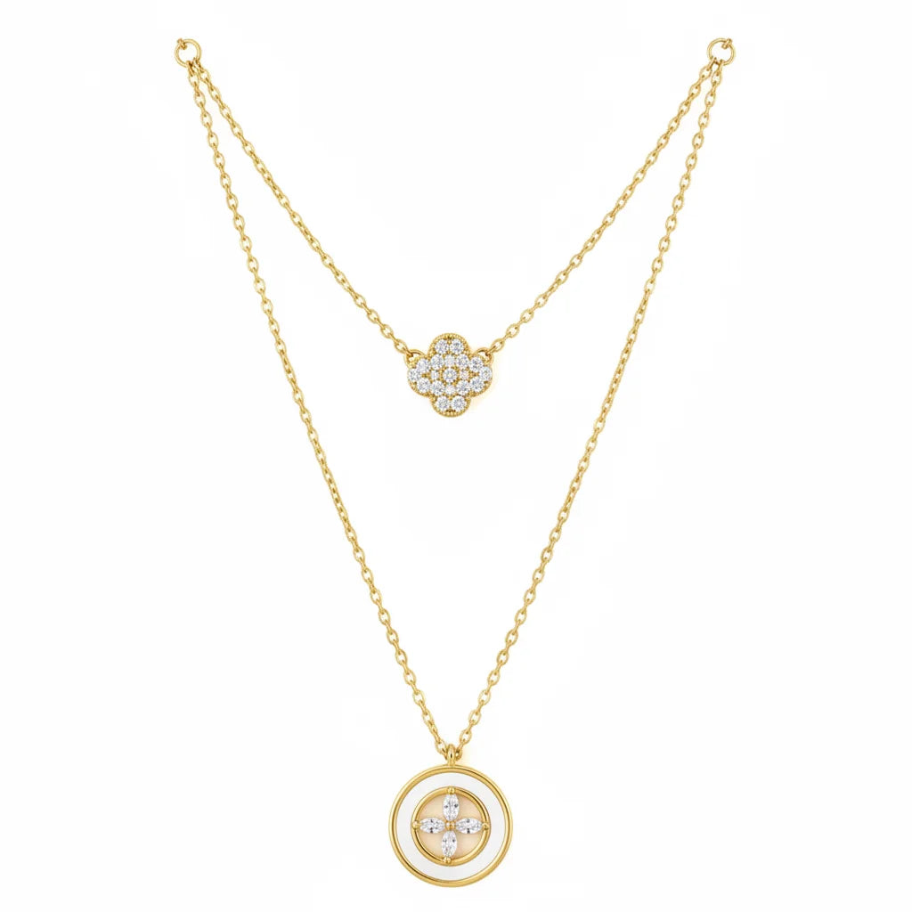 Boho gold layered charm necklace with diamond accents and central stone pendant
