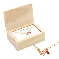 Gold necklace with pink and clear stones in a wooden treasure chest box for TREASURE BOX NECKLACE - BLUSH - LOVE YOU SO MUCH