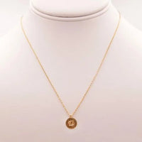 Gold Cancer Zodiac Sign Necklace featuring a small coin pendant for elegant style