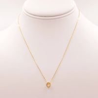 Dainty Initial C Gold Necklace from Daisy Lane, featuring a gold disc pendant