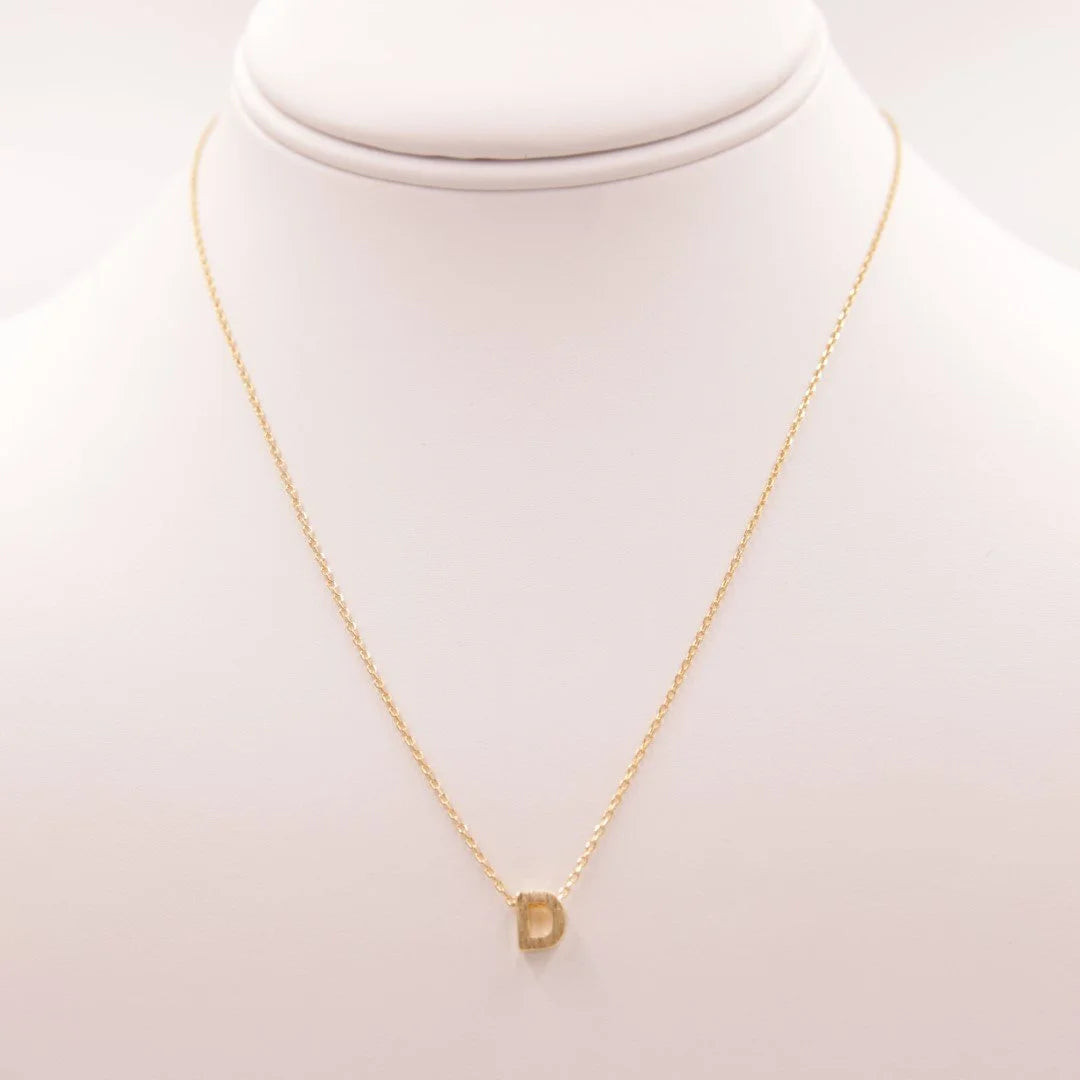 Dainty Initial D Gold Necklace featuring a gold chain and small diamond accent