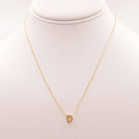 Dainty Initial D Gold Necklace featuring a gold chain and small diamond accent