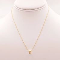 Dainty Initial E Gold Necklace with Diamond from Daisy Lane, showcasing elegance and style