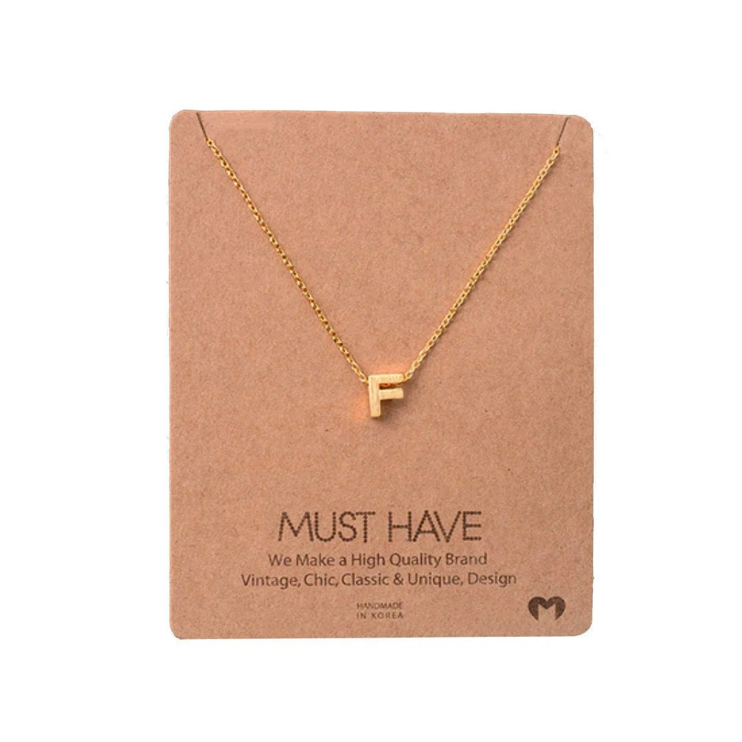 Gold INITIAL F necklace from Daisy Lane, a delicate piece in dainty initial necklaces