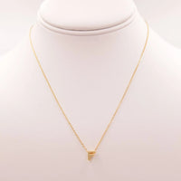 Dainty Initial F Gold Necklace with a small triangle pendant from Daisy Lane