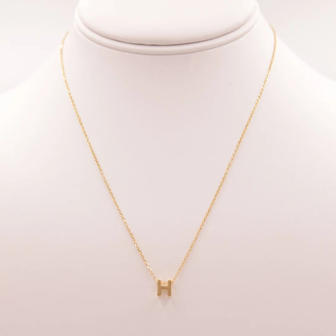 Dainty Initial H Gold Necklace with a Small Diamond from Daisy Lane Collection