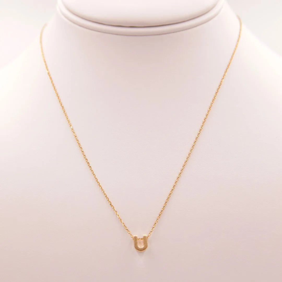 Dainty Initial U Gold Necklace from Daisy Lane featuring a small initial charm