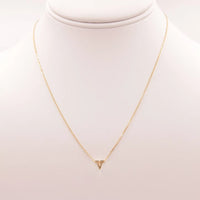 Dainty Initial V Gold Necklace featuring a small triangle design from Daisy Lane