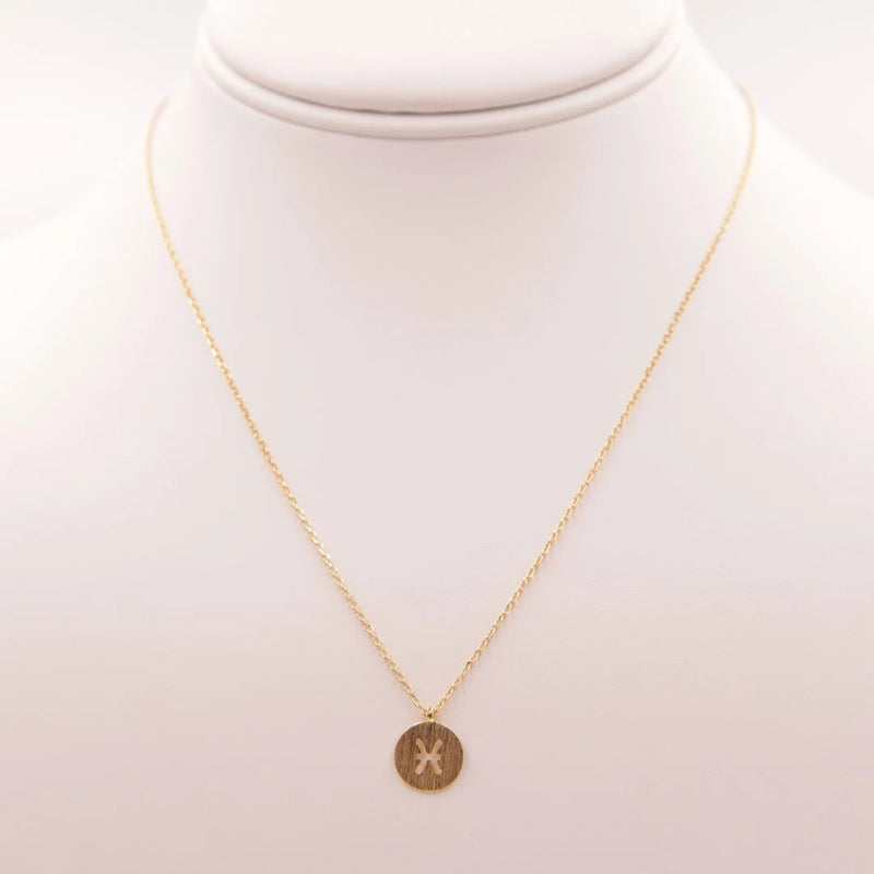 Gold Pisces Zodiac Sign Necklace featuring a delicate star charm