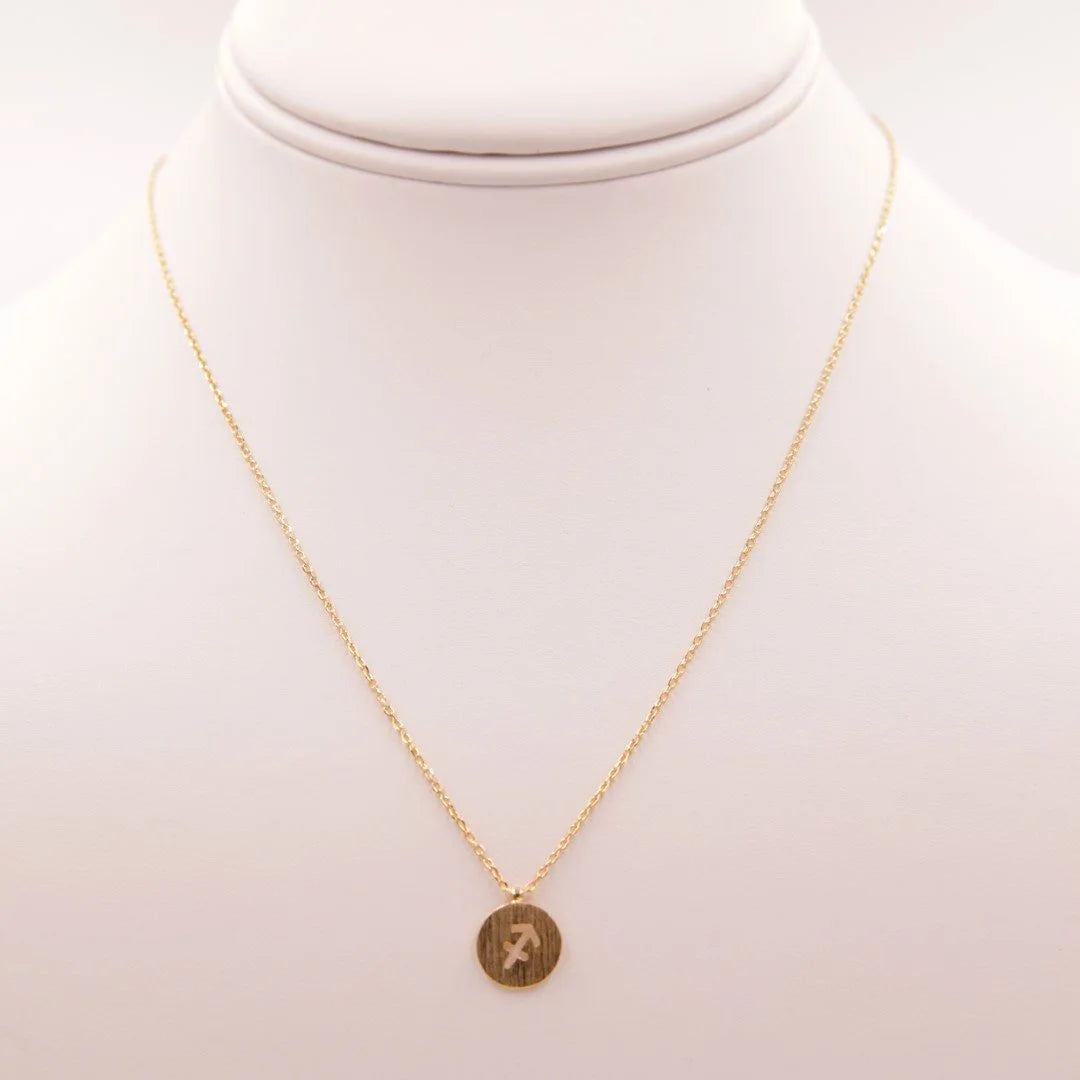 Gold Sagittarius Zodiac Sign Necklace featuring a small coin charm