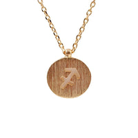 Gold Sagittarius Zodiac Sign Necklace featuring a small initial for personalized style