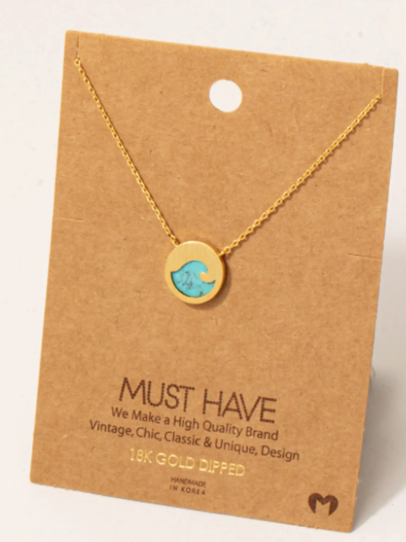 Gold wave necklace with turquoise blue ocean charm pendant perfect for ocean-inspired jewelry