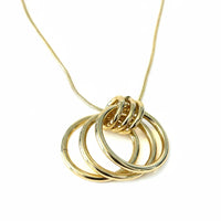 Gold interlocking ring necklace with textured finish and snake chain